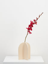 fossil eros vase with red flower