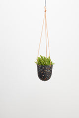 black terrazzo hanging planter